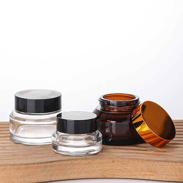 New Design 15ml 30ml 50ml Glass Cosmetic Jar Serum Bottle Thick Bottom Clear Cap Essential Oil Custom Logo Silk