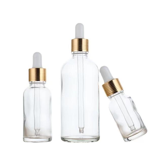 Wholesale 50ml Luxurious Clear Glass Dropper Bottles Custom Logo for Cosmetic Essential Oils Transparent Packaging Box Packed