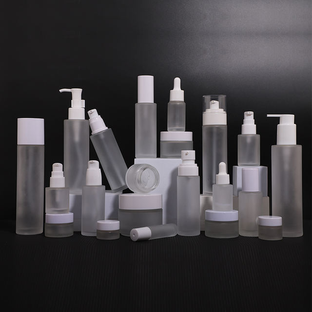 Wholesale Empty Frosted clear Glass Bottle With Lotion Spray Pump for Cosmetic Packaging Skincare Empty Cream Container