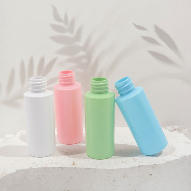 Luxury 50ml Round PET Cosmetic HDPE Bottle with Pump Lid for Cream Lotion Toner for Essence Perfume Packaging Separated Capacity