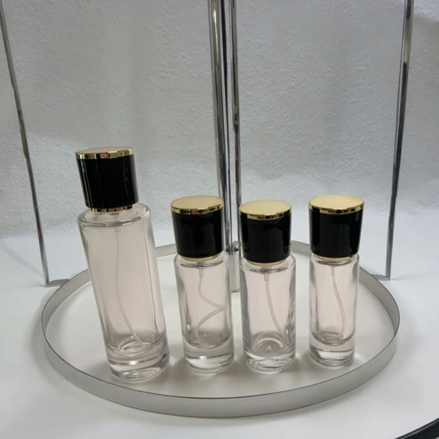 Luxury 10ml 15ml 20ml 30ml Clear Cylinder Shape Perfume Glass Bottle With Spray Pump