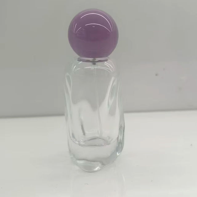 Luxury Irregular Shaped Clear Glass Perfume Spray Bottle Empty Fragrance Vial With Solid Ball Cap Custom Logo Perfume Bottle