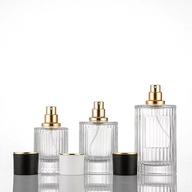 Chenlan High Quality Custom Empty Glass Perfume Bottles Cylinder Shape 30ml 50ml 100ml with Pump Sprayer Packaging Wholesale