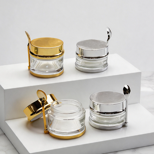Custom 30g 50g 80g Gold Luxury Skin Care Cosmetic Eye Cream Mask Beauty Packaging Clear Glass Jar With Plastic Lid And Spoon
